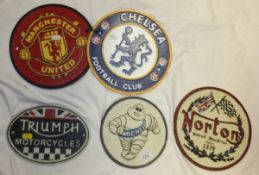 Five reproduction cast metal plaques including Michelin, Norton, Triumph,