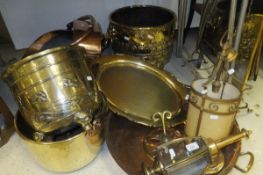 A collection of brass and copper wares to include a Victorian copper coal helmet,