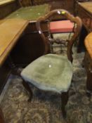 A pair of Victorian rosewood framed bar back dining chairs, a French rush seat bar back elbow chair,