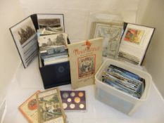 Two boxes of assorted postcards,