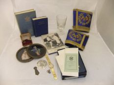 A box containing a quantity of Masonic items, to include 1920's silver medal, various books,