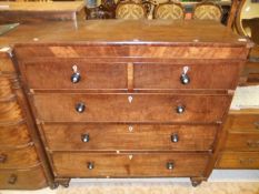 A mahogany chest of two short and three long drawers with turned ebonised handles,