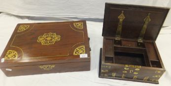 A modern Indian hardwood and brass inlaid rectangular box and another smaller box with brass bound