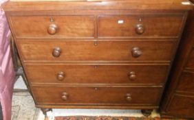 A Victorian mahogany chest of two short and three long graduated drawers,
