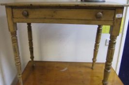 A Victorian pine single drawer side table