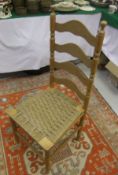 Five beech ladder back dining chairs with string seats,