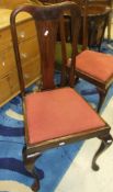 A mahogany extending dining table and six matching chairs