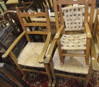Three variously sized pine framed and carved rocking chairs in the Arts and Crafts manner