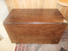 A 19th Century mahogany rectangular drop leaf dining table on scroll carved cabriole legs to claw