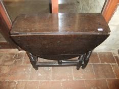 A 19th Century oak oval gate-leg table on bobbin turned legs, united by stretchers CONDITION REPORTS