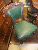 A set of six Victorian mahogany shaped and upholstered back dining chairs with upholstered seats,