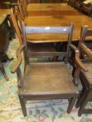 A set of eight 19th Century provincial oak bar back panel seat dining chairs,