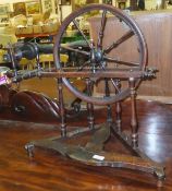 A 19th Century Continental beech and fruitwood table top spinning wheel with baluster turned