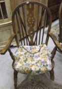 A set of seven (five plus two) wheel back dining chairs CONDITION REPORTS All; knocks and scratches,