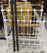 A Victorian cast iron and brass single bed frame