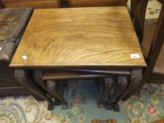 A nest of three early to mid 20th Century Eastern hardwood occasional tables,