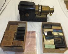 A brass and painted tin magic lantern,