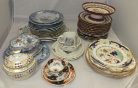 A late 19th / early 20th Century part dessert service decorated in burgundy and gilt and with
