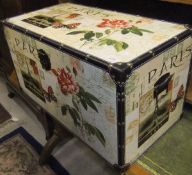 A printed trunk with leatherette corners and brass studs CONDITION REPORTS Trunk is modern, has some