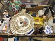 A box containing assorted Staffordshire flatbacks and other assorted decorative china
