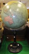 A Jordglob (Stockholm) terrestrial globe, raised on an ebonised base, containing a compass,