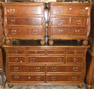 A Louis XV style cherrywood suite by Broyhill comprising armoire with two doors over three drawers,