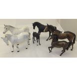 A collection of five Beswick horses and a Beswick foal to include black horse,