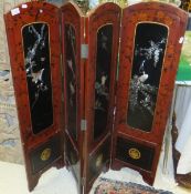 A Japanese lacquered four fold screen with mother of pearl inlay of peacocks and other birds