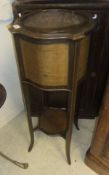 An Edwardian mahogany and inlaid jardinier stand with metal liner,