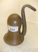 A Victorian brass ear trumpet with open scrollwork grille and foliate engraved body