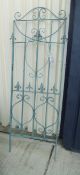 A three panel painted metal Gustav style folding screen with fleur de lys decoration*