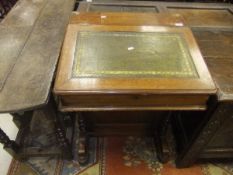 A Victorian mahogany Davenport desk with green leather inset top