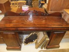 A late Regency/William IV mahogany pedestal sideboard,