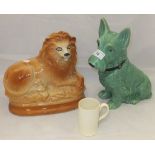 A Staffordshire pottery lion ornament, a large Sylvac figure of a Scottie Dog No'd 1209,