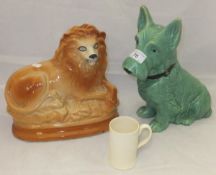 A Staffordshire pottery lion ornament, a large Sylvac figure of a Scottie Dog No'd 1209,