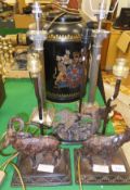 A collection of five various table lamps including two decorated with bronze figures of goats,