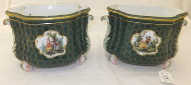A pair of early 20th Century Meissen cachepots of shaped D form and with scrolling acanthus