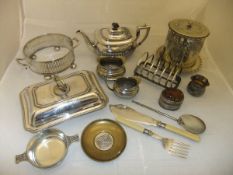 A box of plated wares to include a biscuit tin, three piece tea set, entrée dish, assorted cutlery,