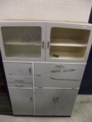 A 1950's kitchen light grey painted kitchen cabinet