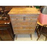 A limed oak and painted chest in the Gothic Revival manner,