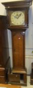 An oak and inlaid cased long case clock,