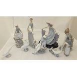 A collection of nine Lladro and other figures to include Lladro girl picking flowers,