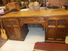 A Victorian oak sideboard in the Arts and Crafts taste,