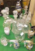 Eight various decanters, pair of glass fish ornaments, Doulton Slater's lacework decorated jug,