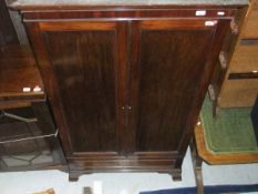 A 19th Century mahogany two door wardrobe / cupboard