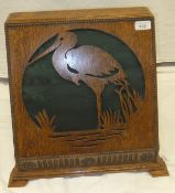 A circa 1929 oak Gecophone speaker case with fretwork carved stork decoration CONDITION REPORTS