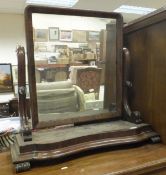 A large Victorian mahogany dressing mirror with shaped base