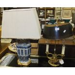 A modern Chinese blue and white vase table lamp with cream shade,