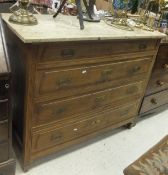 A late 19th Century Continental marble top commode of four long drawers and a hardwood circular