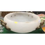 A large alabaster ceiling light shade with four brass handle decoration